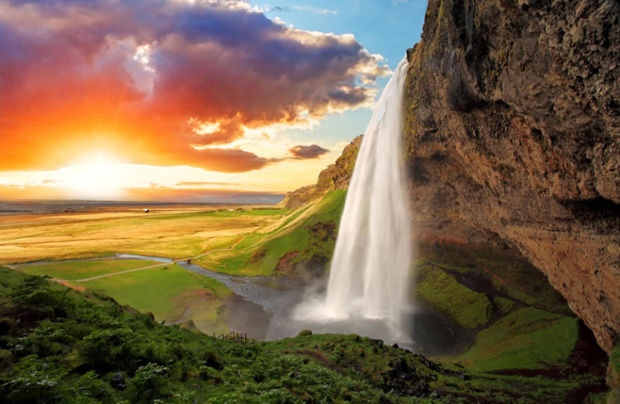 Seljalandsfoss waterfall at sunset on Iceland's south coast